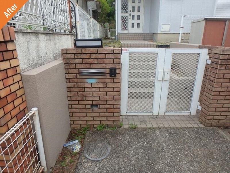 堺市南区の外壁塗装後の積水ハウス施工の住宅の門