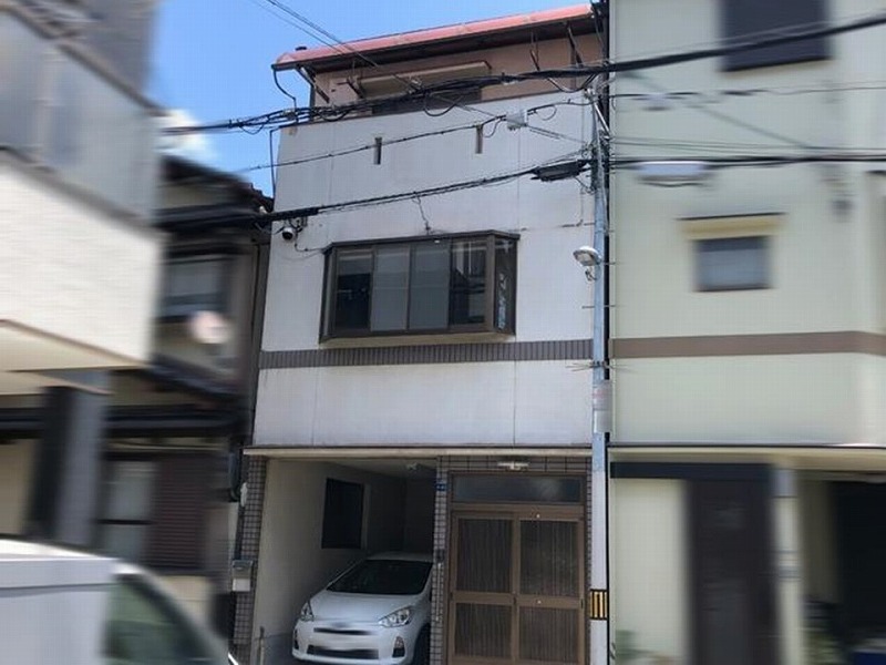大阪市東住吉区のモルタル外壁とスレート瓦の戸建て住宅