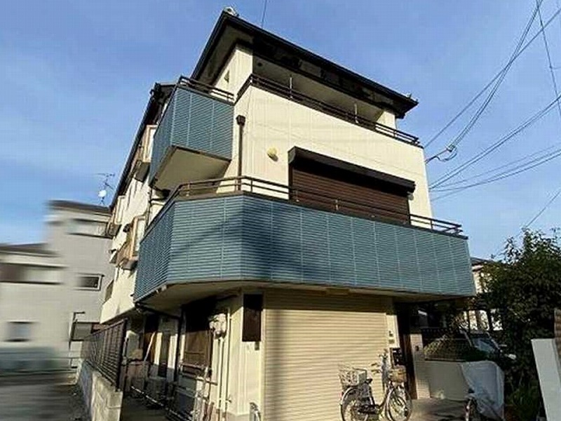 ベージュ×グリーンを組み合わせた外壁の事例2