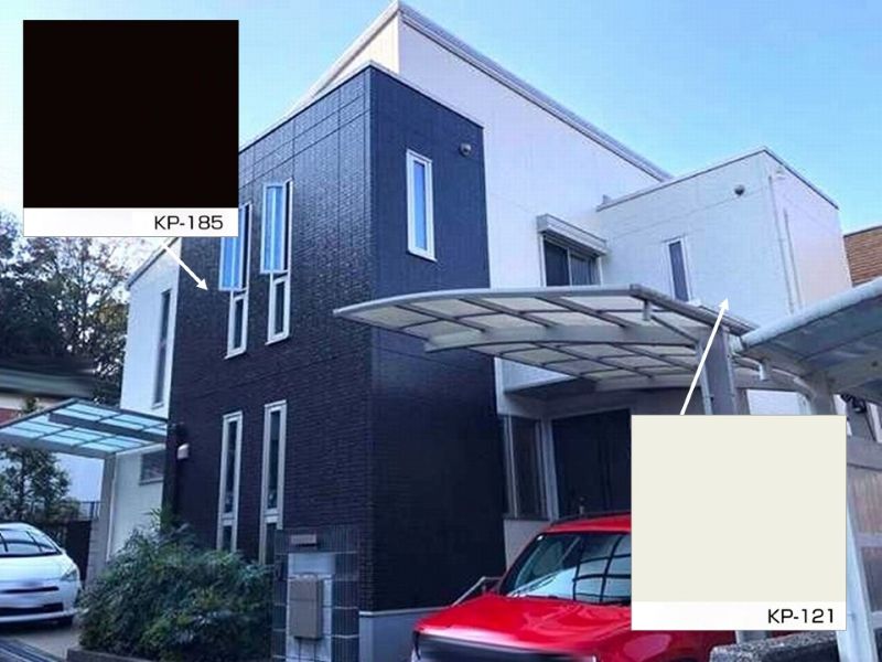 白ベースに玄関前の1階と2階を黒のアクセントカラーで仕上げた施工事例の色