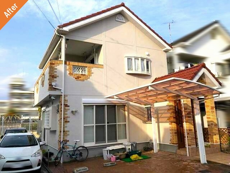 外壁塗装後のベルアート吹き付け仕上げの戸建て住宅