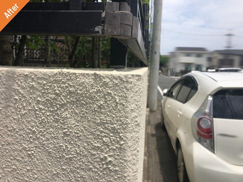 補修後のひび割れが改善した塀