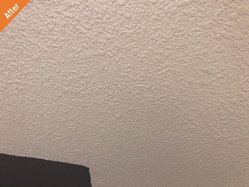 ひび割れ補修後の共用部外壁