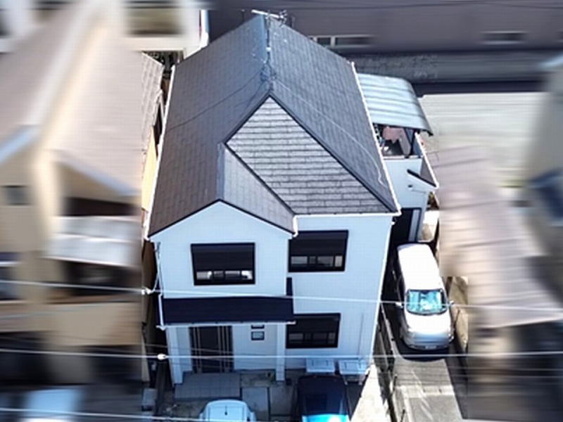 屋根・外壁塗装工事完工後の藤井寺市の住宅全景